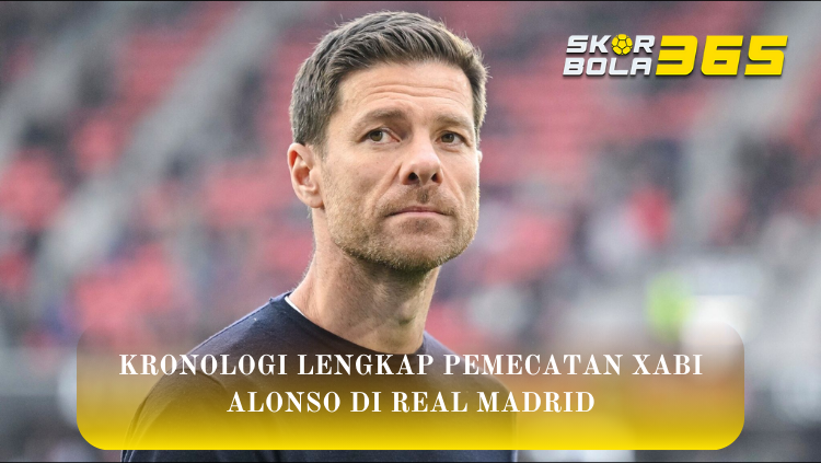 Close up wajah Xabi Alonso dengan ekspresi serius, terdapat teks Kronologi Lengkap Pemecatan Xabi Alonso di Real Madrid dan logo SKORBOLA365 di latar belakang stadion yang buram.