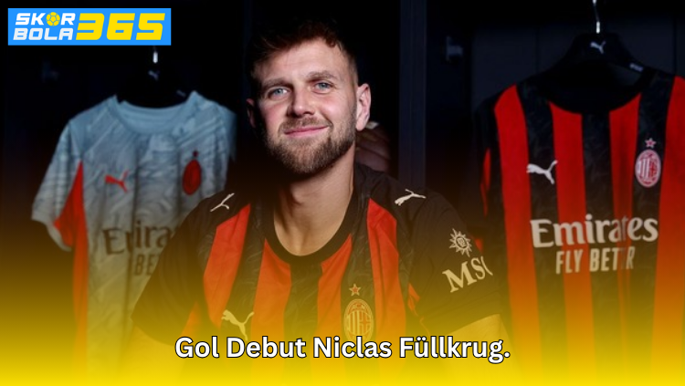 Niclas Füllkrug berpose setelah mencetak gol debut dengan seragam merah hitam di ruang ganti tim