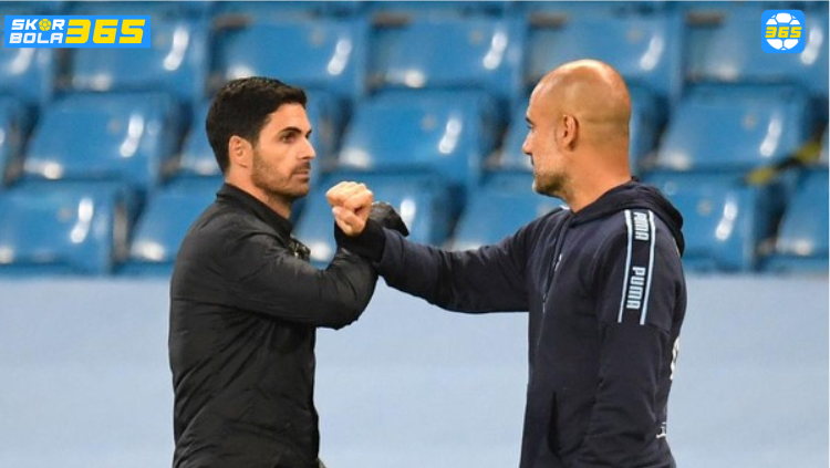 Mikel Arteta dan Pep Guardiola berjabat tangan jelang final Carabao Cup 2026. Analisis selengkapnya di SKOR BOLA 365.
