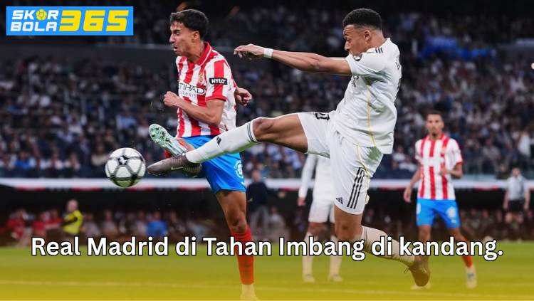 Pemain Real Madrid berebut bola dengan pemain Girona dalam pertandingan yang berakhir imbang di kandang